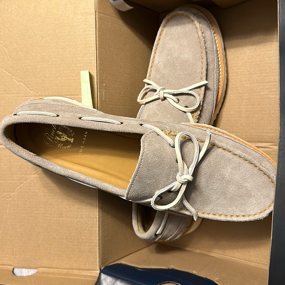 NWOT never worn outside. Box is a little beat ip but the shoes are flawless.